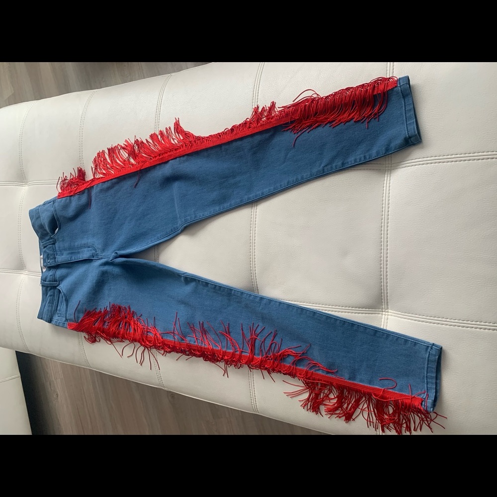 Denim skinny leg red fringe pants